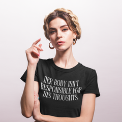 Black feminist shirt that says her body isn't responsible for his thoughts in white writing- Shop Feminist Apparel
