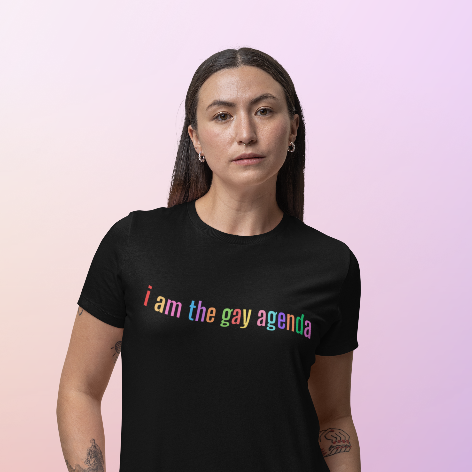 Black pride tshirt that says I am the gay agenda in rainbow wavy writing. Shop Pride Themed Shirts