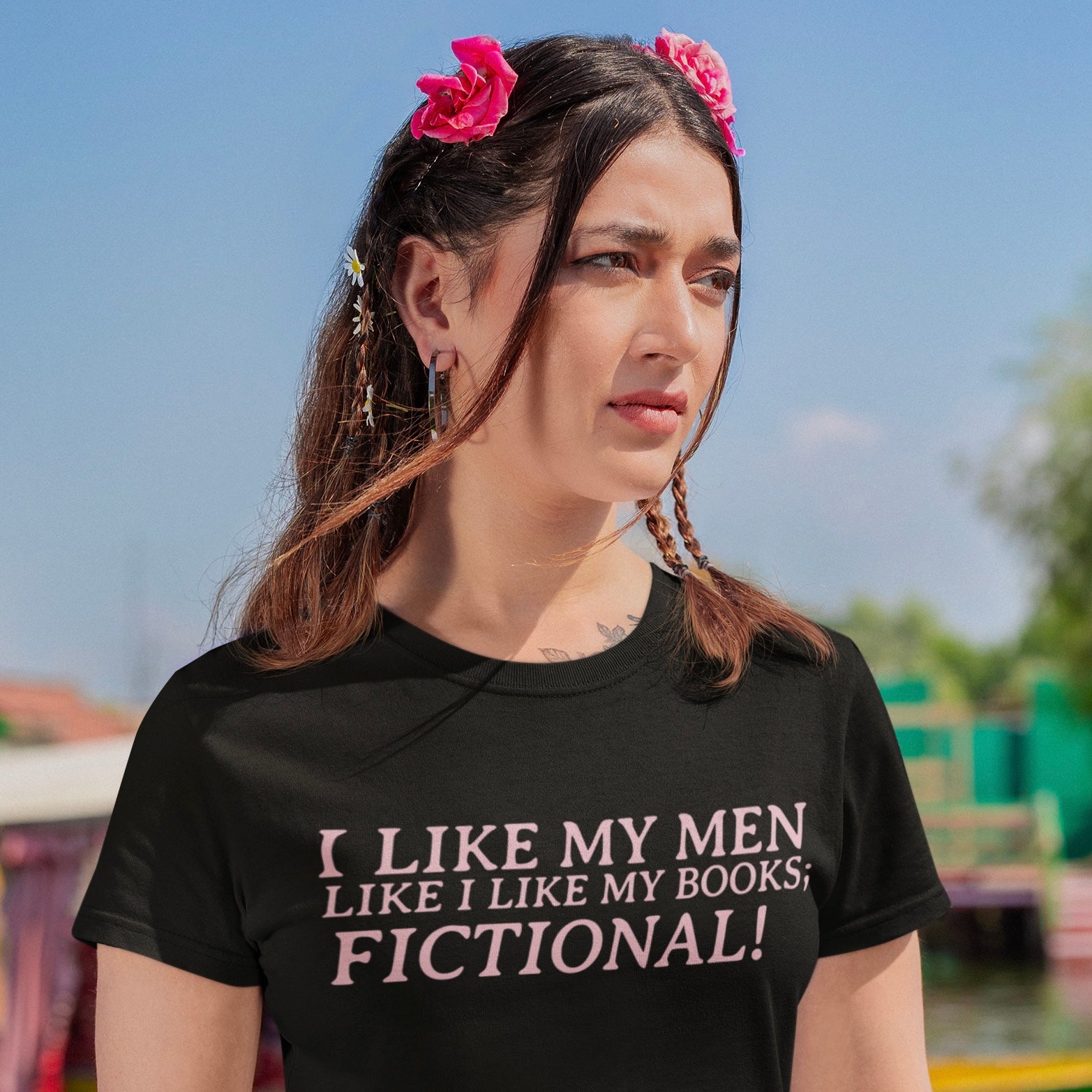 black feminist tee that says I like my men like I like by books; fictional! in pink writing- shop feminist trash for feminist clothing and book lover tees.