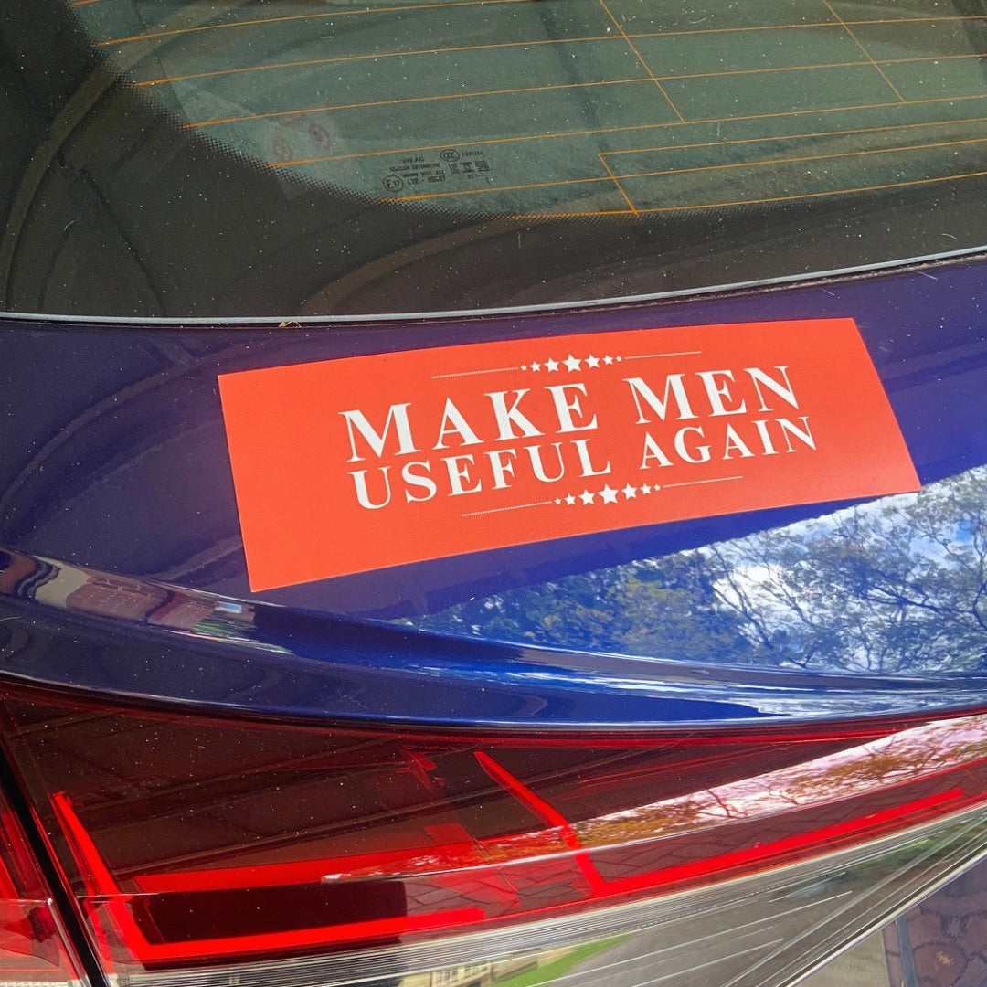 anti maga car magnet that says make men useful again in white writing on a red background- shop feminist trash for political car magnets and funny bumper stickers