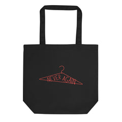 black pro choice feminist tote bag that says never again inside an illustrated coat hanger- shop feminist trash for pro choice t-shirts and political clothes