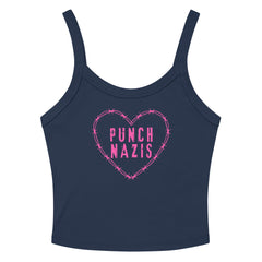 navy bluespaghetti strap crop top that says punch nazis in pink distressed writing inside of a barbed wire heart. Shop feminist trash for feminist tees and political tee shirts
