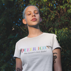 White Pride Shirt that say queer icon just like jesus's two dads in the pride flag colours. Shop social justice clothing, pride merch and pride shirts today!