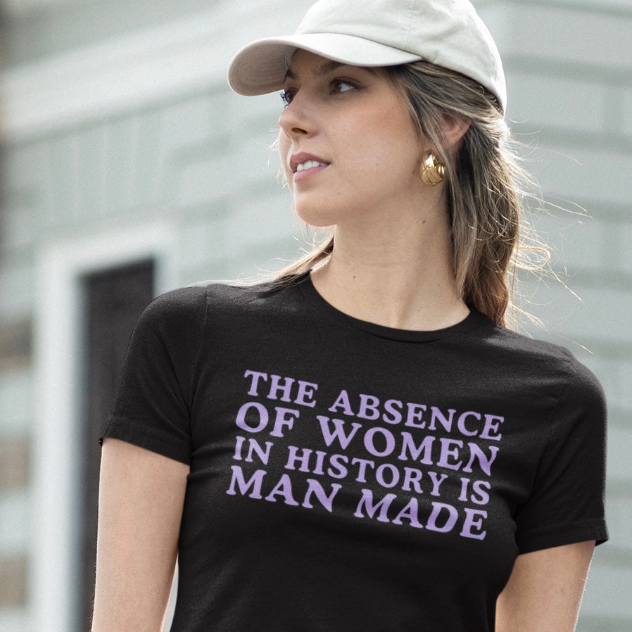 Black Feminist Tee that says the absence of women in history is man made in purple bold writing- Shop social justice feminist shirts