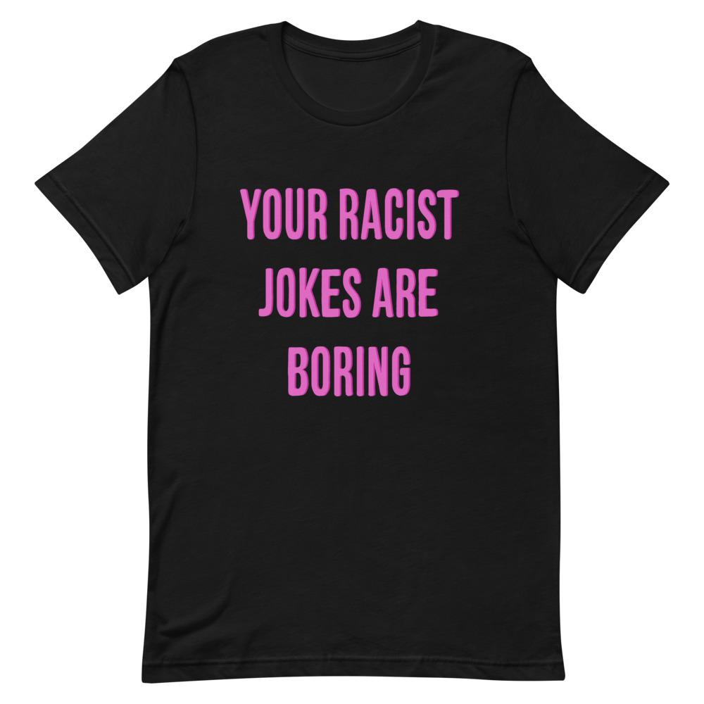 Black Feminist T-Shirt that says "Your Racist Jokes Are Boring" in pink writing - Express grl pwr with our feminist clothing, political clothes, dump him shirts, pride shirts and witchy outfits