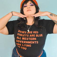 Bold Black Feminist T-shirt- "Roses Are Red, Violets Are Blue, All Western Governments Are Lying to You" - Shop Empowering Feminist Shirts, feminist clothing, dump him shirts, pride outfits, political clothing and  witchy outfits