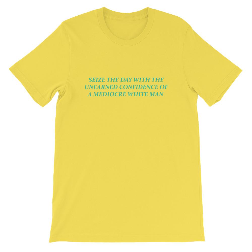 Yellow Feminist T-shirt that says Seize The Day With The Unearned Confidence Of A Mediocre White Man in light teal writing- Shop Feminist Trash Store for funny t shirts for women, feminist apparel, acab t-shirts and dump him shirts