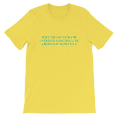 Yellow Feminist T-shirt that says Seize The Day With The Unearned Confidence Of A Mediocre White Man in light teal writing- Shop Feminist Trash Store for funny t shirts for women, feminist apparel, acab t-shirts and dump him shirts