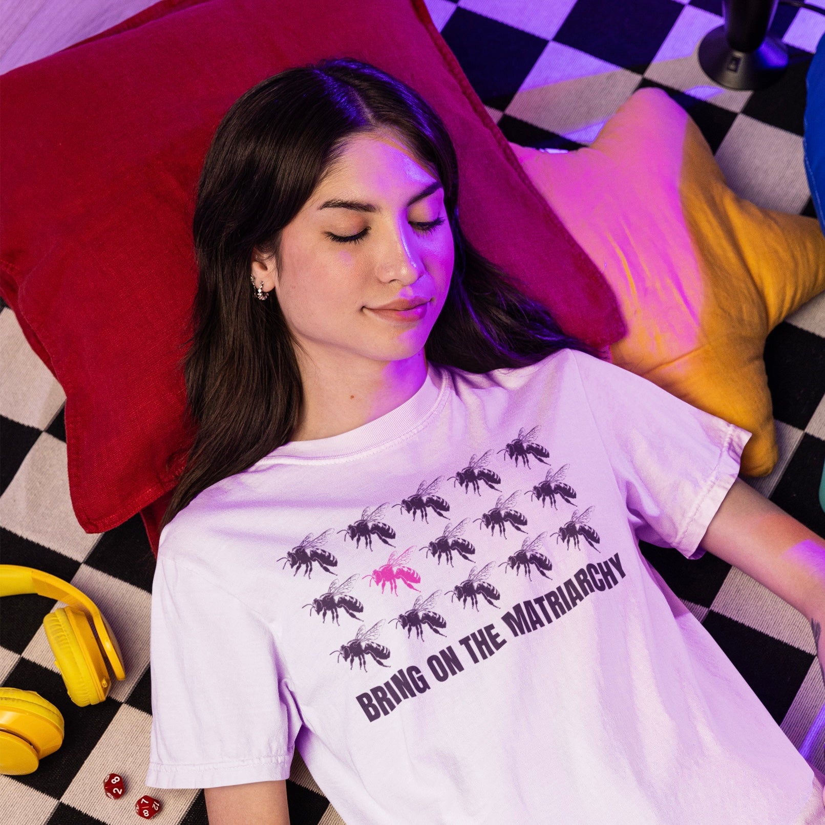 whit feminist tshirt that says bring on the matriarchy in bold black writing. Featuring 15 bees in a row to represent the matriarchy- shop feminist trash for feminist clothes, political clothing and dump him shirts