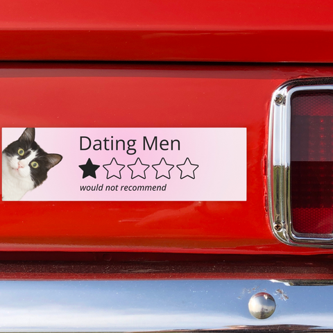 pink gradient magnetic feminist bumper sticker that says one star dating men would not recommend featuring a image of aa silly looking tuxedo cat- shop feminist trash for funny bumper stickers and feminist clothing