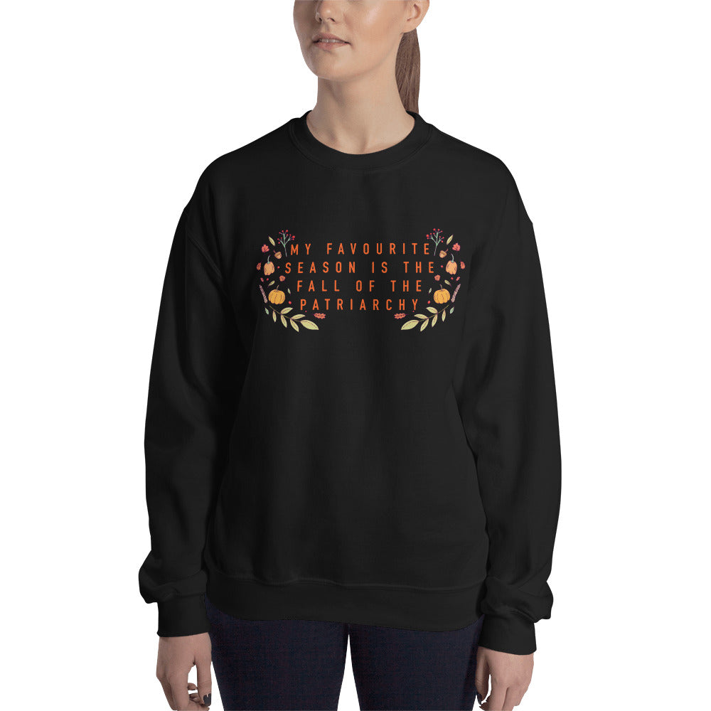 Empowering black feminist sweatshirt featuring 'My Favorite Season is the Fall of the Patriarchy,' promoting a message of empowerment and advocating for gender equality- shop feminist trash store for feminist apparel and dump him shirts
