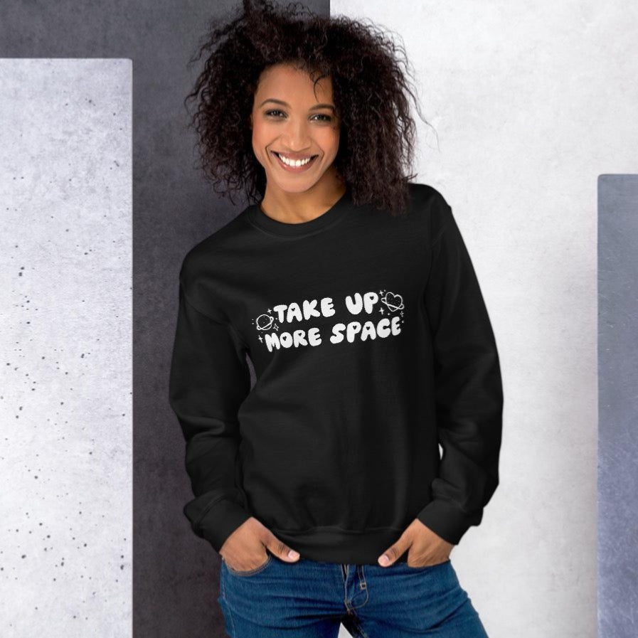 Empowering black feminist sweatshirt featuring 'Take Up More Space,' promoting a message of empowerment and advocating for gender equality. Shop feminist Trash for political clothing, dump him shirts and feminist apparel.