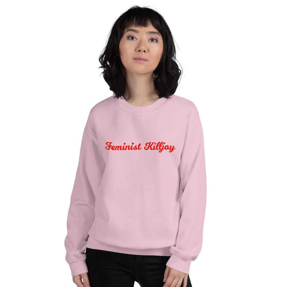 Light pink feminist sweatshirt with 'Feminist Killjoy' text, symbolizing empowerment and advocating for gender equality, perfect for women’s rights