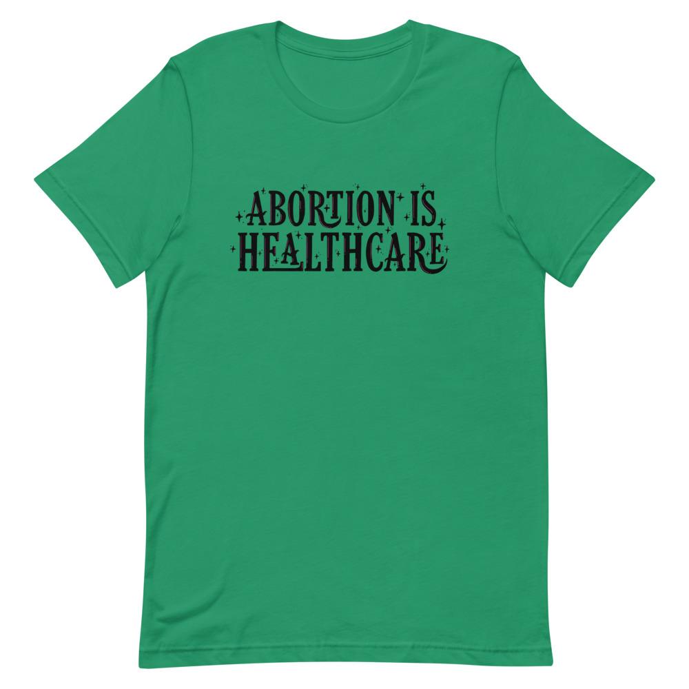 Empowering feminist t-shirt in Kelly green advocating 'Abortion is Healthcare in black hand lettering- Shop feminist tshirts