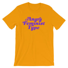 Gold feminist t-shirt boldly proclaiming "Angry Feminist Type." in purple retro writing- define feminism with our feminist tees, dump him sweatshirts, political clothing, witchy outfits and pride tees