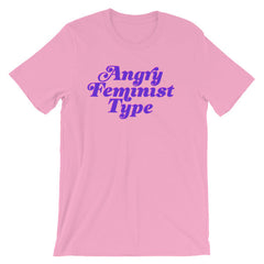 Pink feminist t-shirt boldly proclaiming "Angry Feminist Type." In purple writing- define feminism with our feminist apparel, political clothing, dump him shirts, pride outfits, and witchy outfits