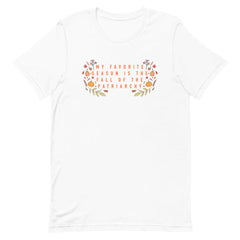 white feminist shirt featuring 'My Favorite Season Is The Fall Of The Patriarchy in orange writing- shop feminist trash for feminist shirts, political clothing and dump him shirts
