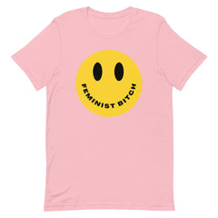 Pink feminist t shirt boldly stating "Feminist Bitch" with a yellow smiley face
