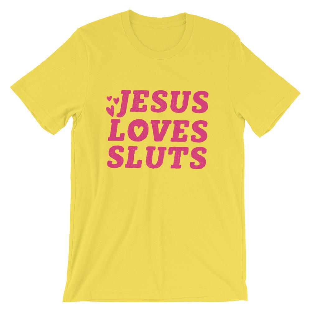 Yellow feminist shirt that says 'Jesus Loves Sluts' in red hand lettered writing- shop Feminist Trash for feminist apparel, political clothing, acab t-shirts, pride outfits and dump him shirts.