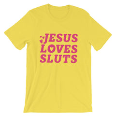 Yellow feminist shirt that says 'Jesus Loves Sluts' in red hand lettered writing- shop Feminist Trash for feminist apparel, political clothing, acab t-shirts, pride outfits and dump him shirts.