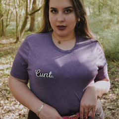 Purple triblend feminist t shirt boldly featuring "Cunt" in white writing- define feminism with our bold feminist apparel, dump him shirts, pride clothes and political tshirts