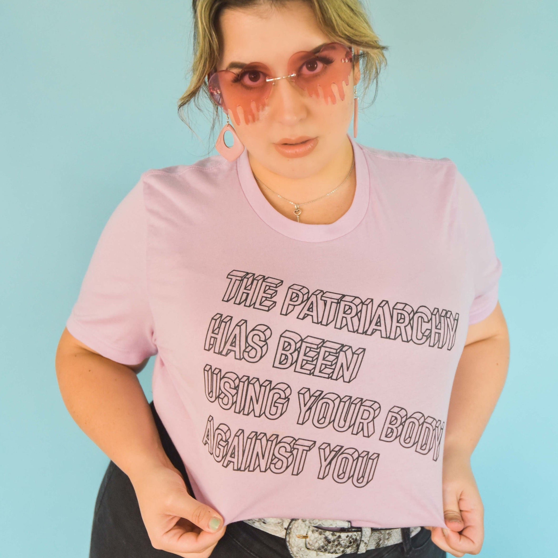 Lilac Feminist Tee - "The Patriarchy Has Been Using Your Body Against You" - Shop Empowering Feminist Apparel