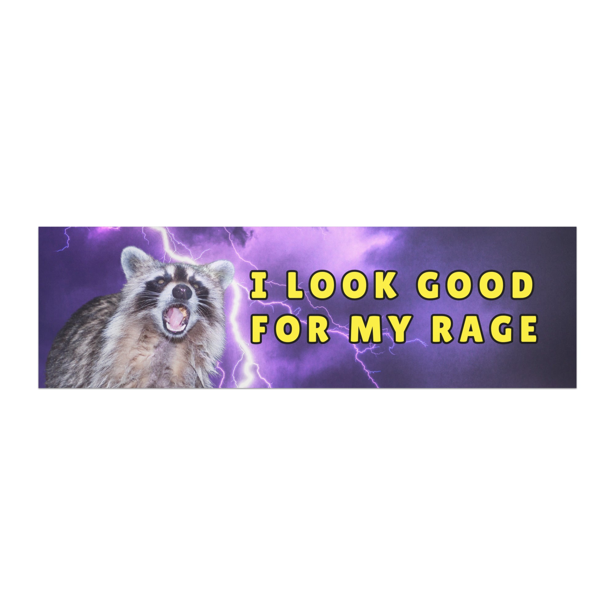 An i look good for my rage funny feminist magnetic bumper sticker attached to the rear panel of a silver car below the rear window. The magnet displays a chaotic raccoon design with purple lightning and yellow text.