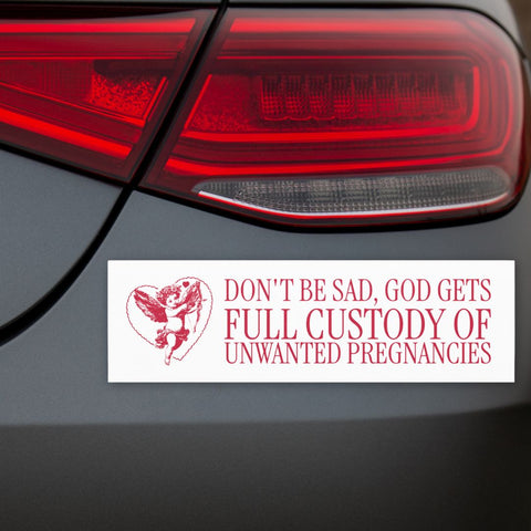 magnetic feminist bumper sticker that says don't worry god gets full custody of unwanted pregnancies in red writing. Featuring an illustration of a ref cherub in a heart holding a bow and arrow. Shop feminist trash for feminist bumper stickers and political clothes