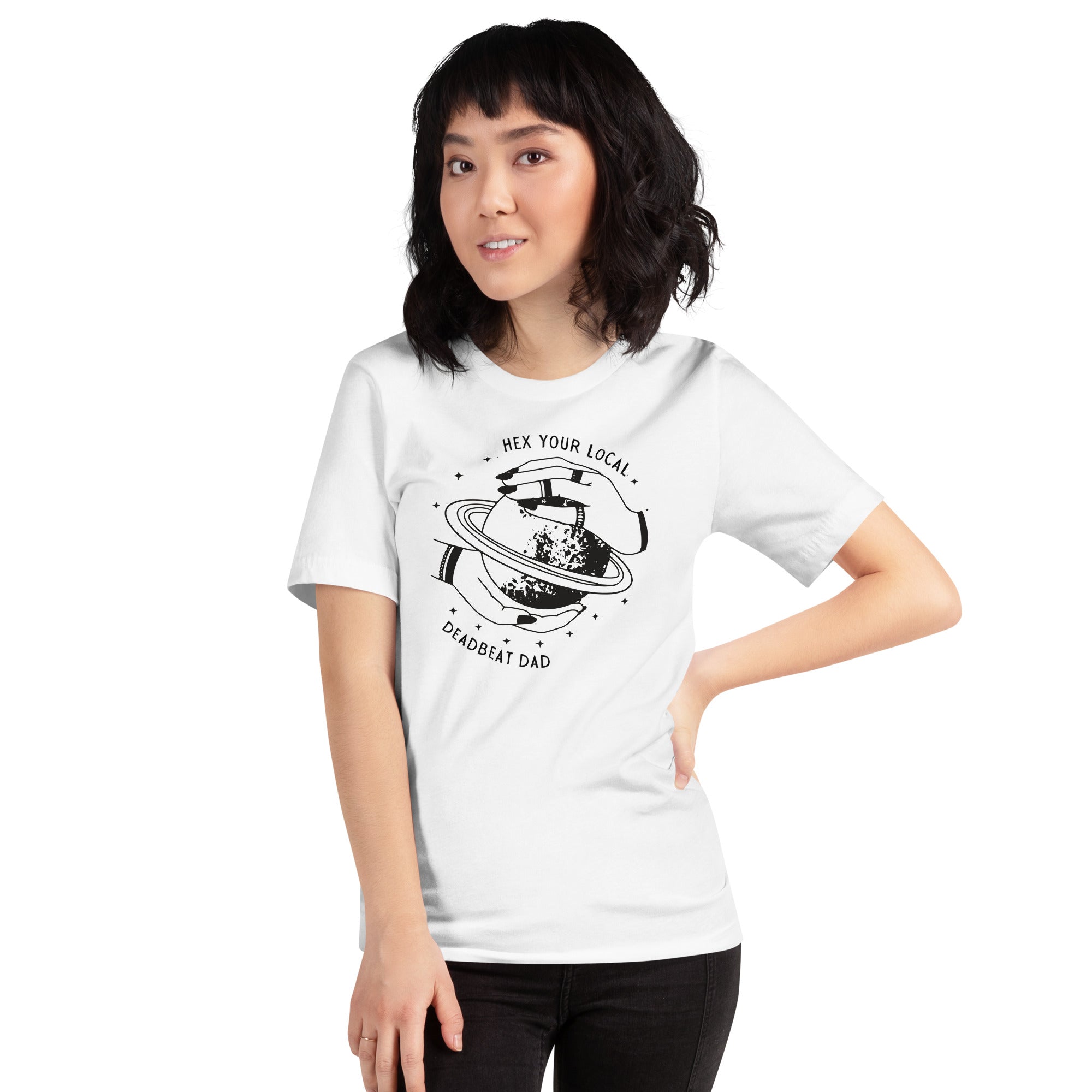 white feminist shirt that says hex your local deadbeat dad in black writing, featuring a witchy black illustration of hands around Saturn. Shop feminist trash for funny feminist t-shirts and witchy feminist clothing