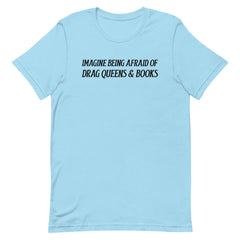 blue pride t-shirt that says imagine being afraid of drag queens and books in black writing. Shop feminist trash for pride merch, pride outfits, political clothes and feminist apparel
