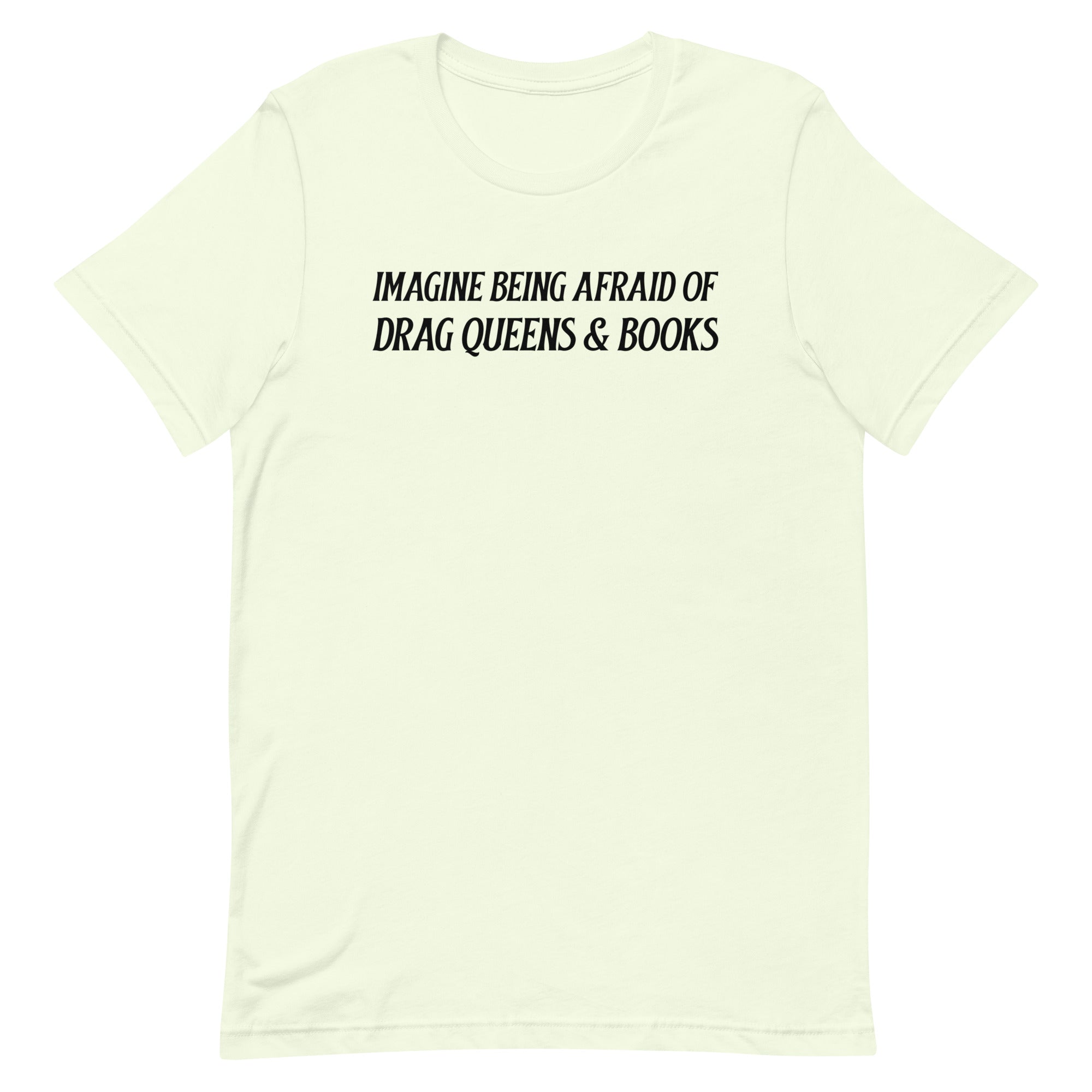 light yellow/citreon pride t-shirt that says imagine being afraid of drag queens and books in black writing. Shop feminist trash for pride merch, political clothes and pride outfits