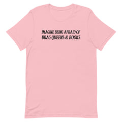 pink pride t-shirt that says imagine being afraid of drag queens and books in black writing. Shop feminist trash for pride outfits, feminist t shirts, acab t-shirts and pride merch