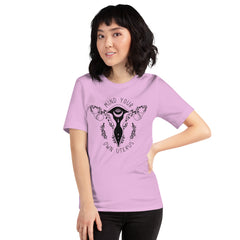 lilac feminist tee that says mind your own uterus featuring a black witchy illustration of a uterus- shop feminist attire