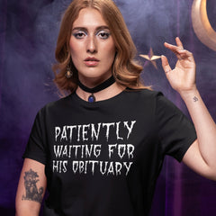 black anti trump t-shirt that says patiently waiting for his obituary in white spooky writing- shop feminist trash for political t-shirts