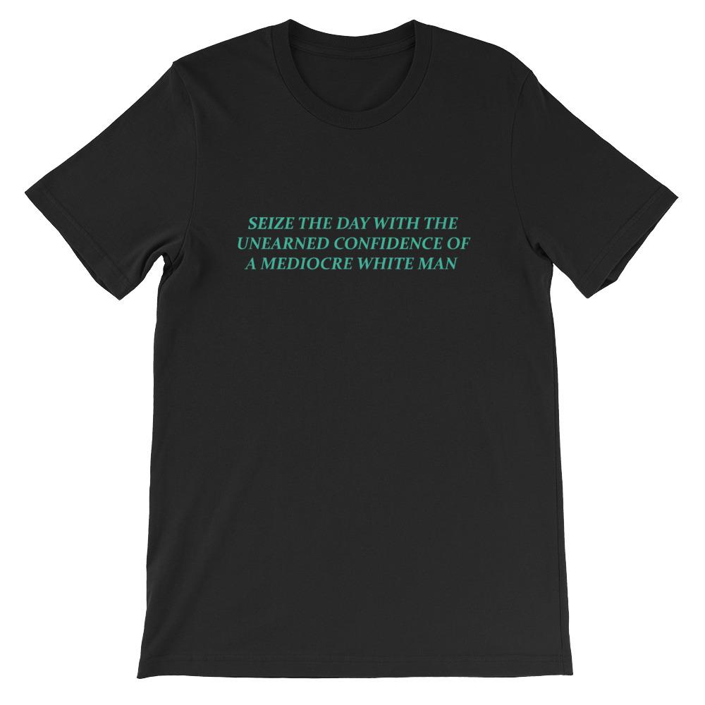 Black Feminist shirt that says Seize The Day With The Unearned Confidence Of A Mediocre White Man in light teal writing- Shop Feminist Trash Store for funny t shirts for women, political clothing, pride shirts and dump him shirts