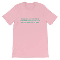 Pink Feminist T-shirt that says Seize The Day With The Unearned Confidence Of A Mediocre White Man in light teal writing- Shop Feminist Trash Store for funny t shirts for women, political clothing, acab t-shirts and pride shirts