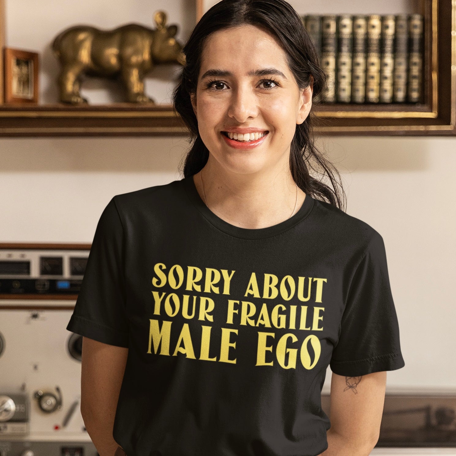 black feminist tee that says sorry about your fragile male ego in yellow writing- shop feminist trash for funny feminist shirts and women's march merchandise