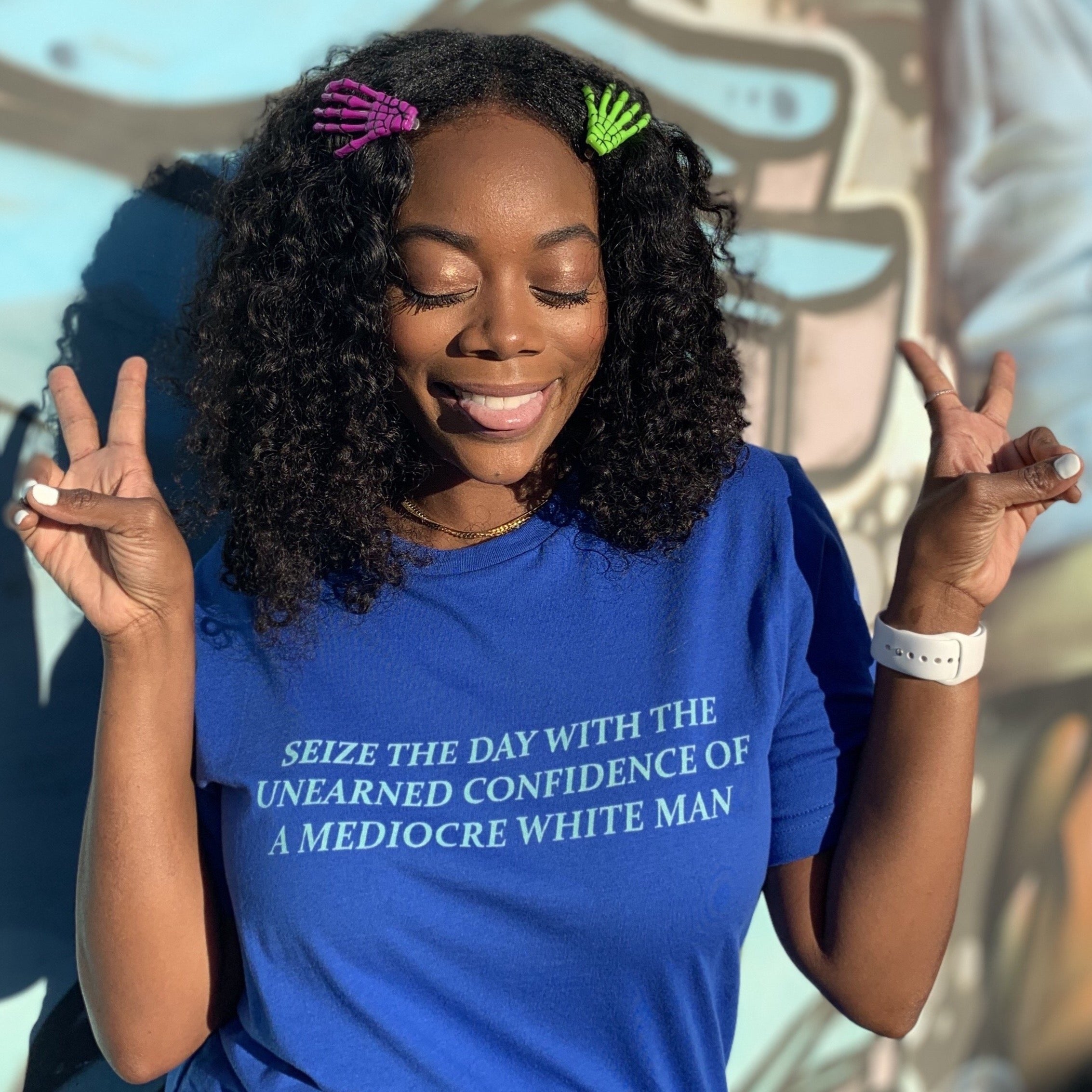 True Royal Feminist T-shirt that says Seize The Day With The Unearned Confidence Of A Mediocre White Man in light teal writing- Shop Feminist Trash Store for funny t shirts for women, political clothing, acab t-shirts and dump him shirts