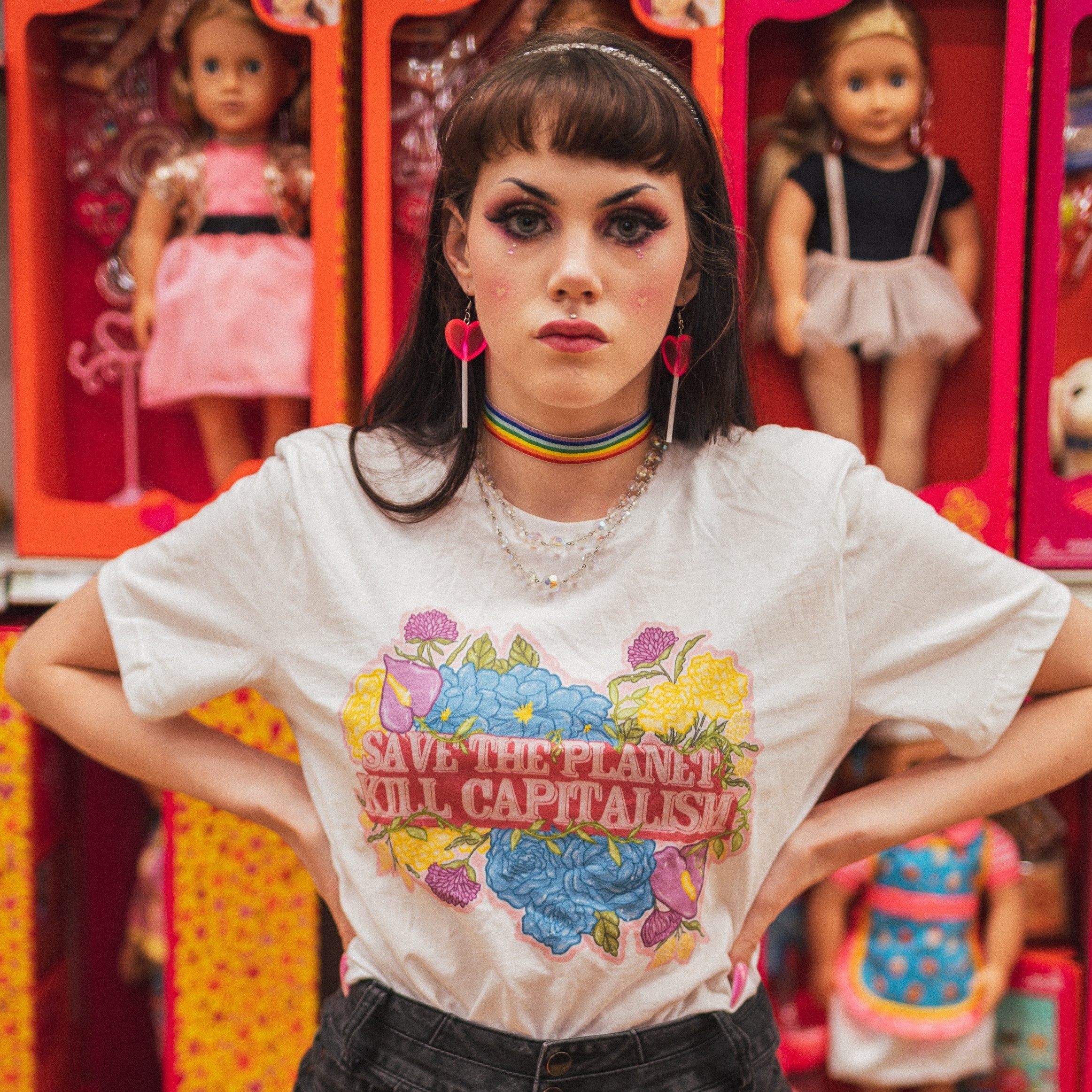 White feminist t-shirt that says'Save The Planet Kill Capitalism' slogan with a floral graphic- shop Feminist Trash for political clothing, acab t-shirts, and funny t shirts for women