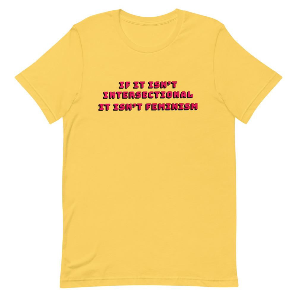 Empowering yellow feminist shirt featuring 'If It Isn’t Intersectional It Isn’t Feminism' in red, advocating for equality and inclusion. Shop feminist t shirts, political clothing and dump him shirts.