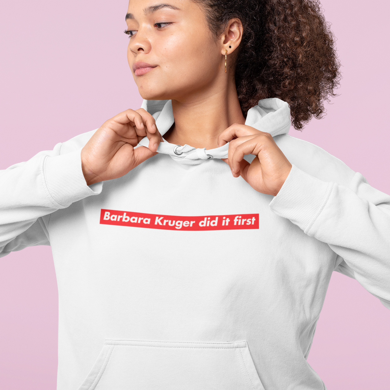 White Feminist Hoodie That says Barbara Kruger did it first in the supreme logo- Shop feminist apparel and dump him shirts