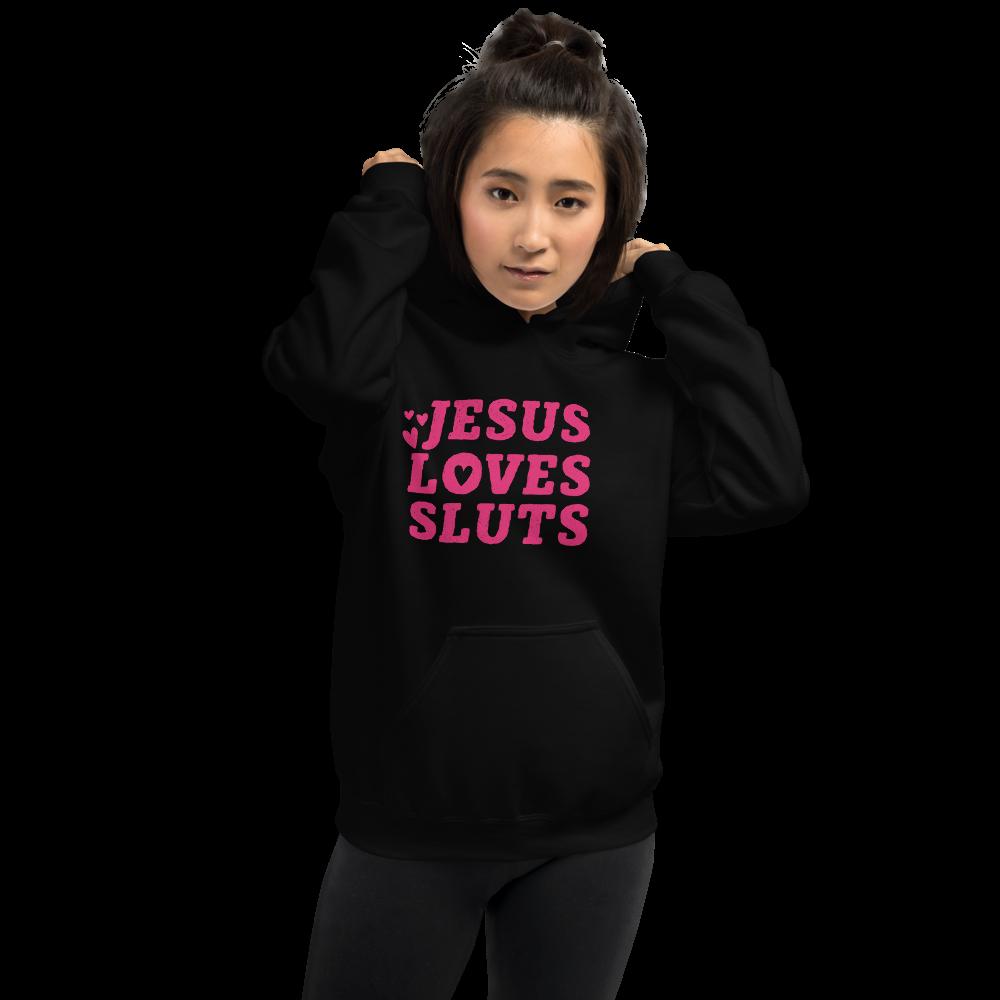 Black Feminist Hoodie that says Jesus Loves Sluts In red writing featuring three love hearts. Shop Feminist Trash for feminist tees, political clothing, dump him shirts, witchy outfits and pride tshirts