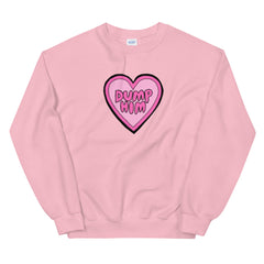 Pink feminist sweatshirt featuring a pink heart illustration with the words dump him written in bubble writing- shop our array of dump him shirts