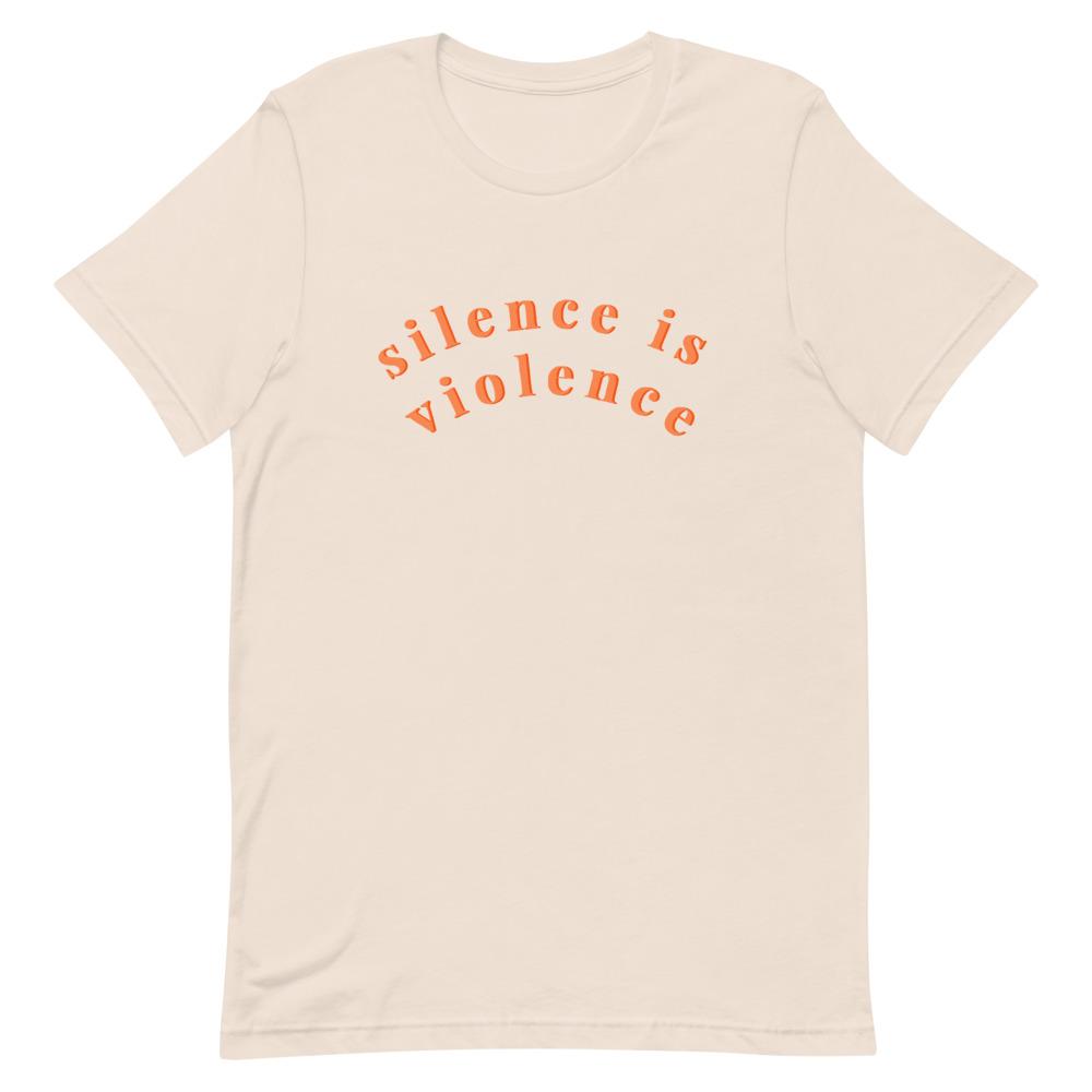 Soft Cream coloured Feminist tee that says silence is violence in bold orange lowercase writing- Shop Social Justice tees
