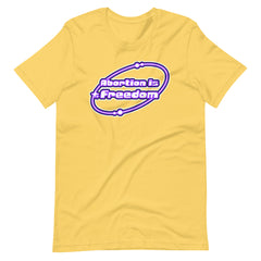 yellow feminist tshirt that says abortion is freedom in a purple and white y2k circular graphic. Shop Feminist Trash for pro choice tshirts and political clothes