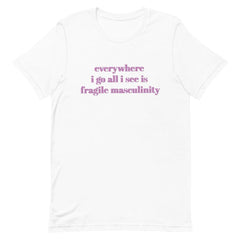 white feminist tee that says Everywhere I Go All I See Is Fragile Masculinity in purple lowercase font. Shop Feminist Trash for feminist tshirts, political clothing, ACAB shirts, Witchy outfits and dump him shirts