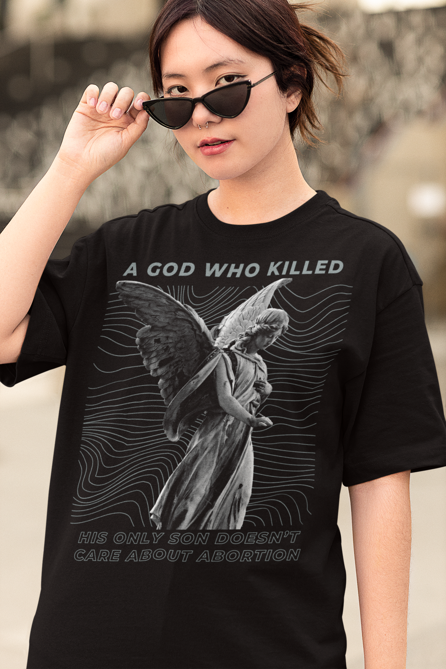 A God Who Killed His Own Son Doesn’t Care About Abortion Unisex Black Oversised Feminist T-shirt - Feminist Trash Store - Shop Women’s Rights T- Shirts and political clothes