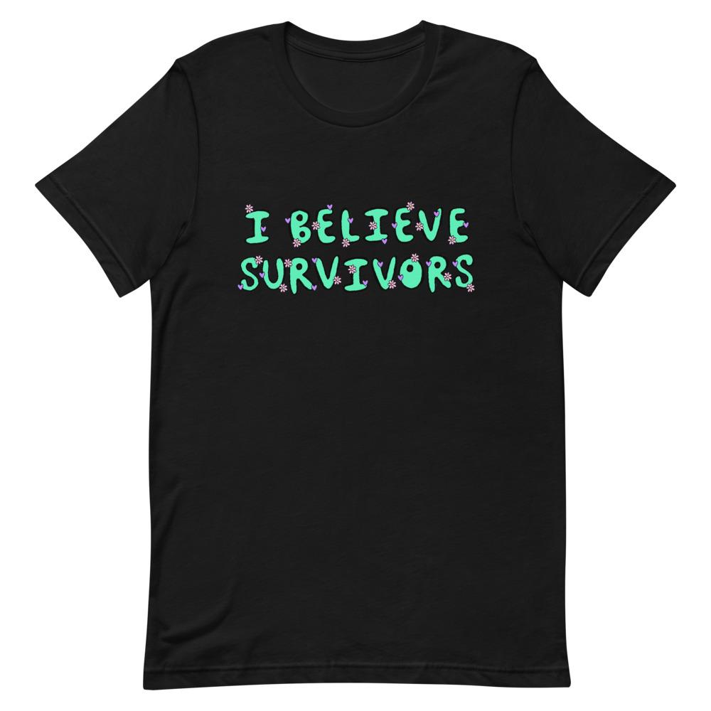black feminist t-shirt that says believe survivors in green bubble writing with tiny purple daisy illustrations. Shop Feminist Trash for political clothing, pride outfits, feminist apparel, dump him shirts and witchy outfits
