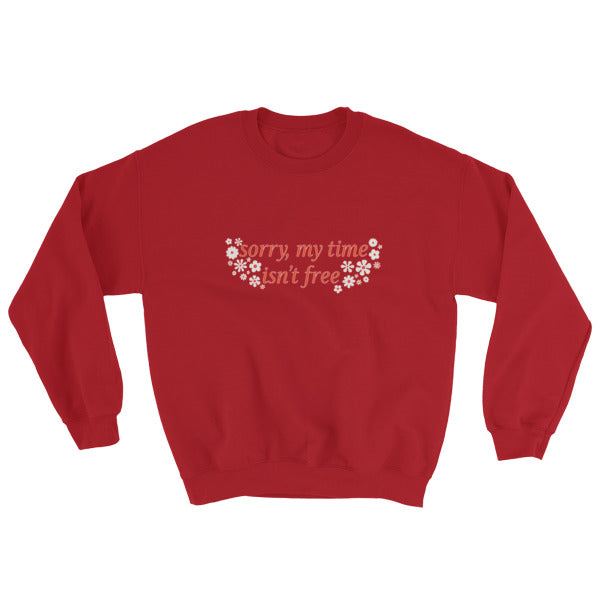 red feminist sweatshirt that says sorry my time isn't free in orange writing surrounded by white and orange retro flowers- shop feminist shirts, political clothes and dump him shirts