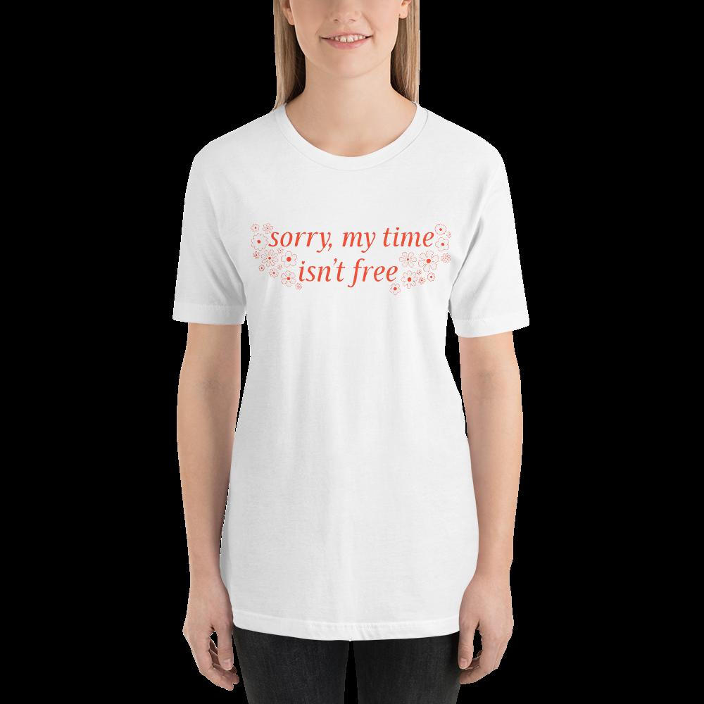 white feminist tshirt that says sorry my time isn't free in orange writing surrounded by white flowers- shop feminist apparel, dump him shirts and political clothing